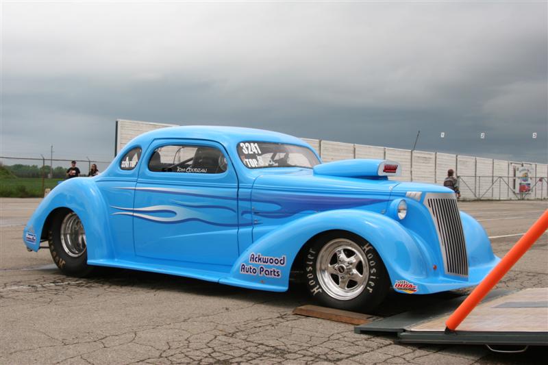 A replica 1937 Chev Coupe built by Tom Colbran with Ackwood Auto Parts sponsorship on it